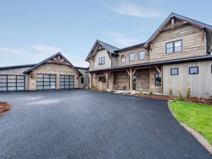 A finished driveway running up to a Fraser Valley home