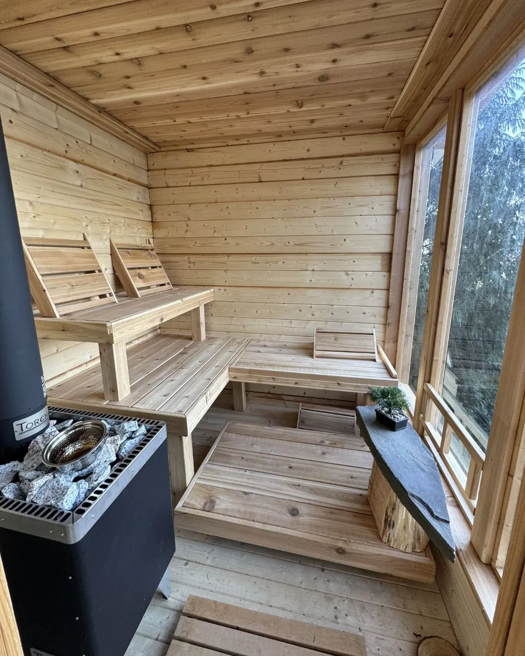The cedar interior of a sauna built on a finished terrace
