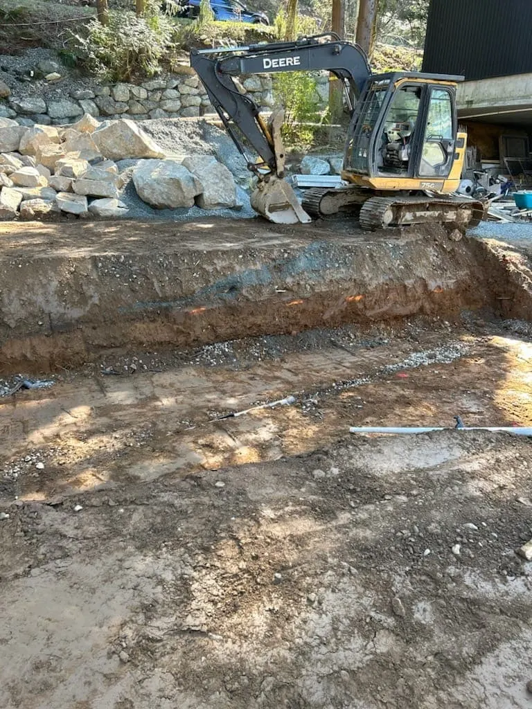 A septic trench with gravel and pipe