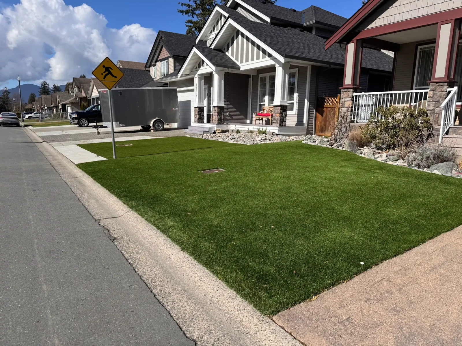 Artificial turf in a shaded front yard